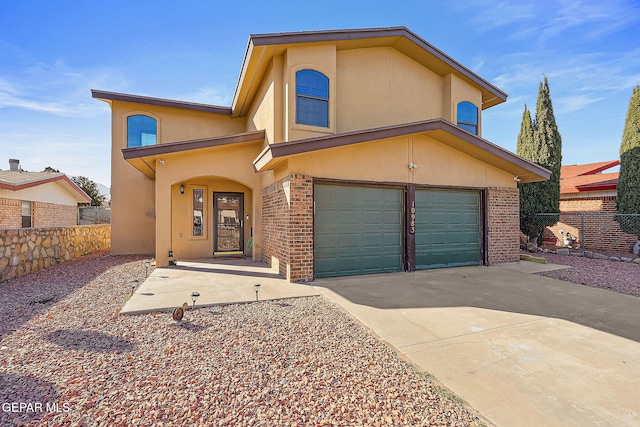 view of front of property with a garage