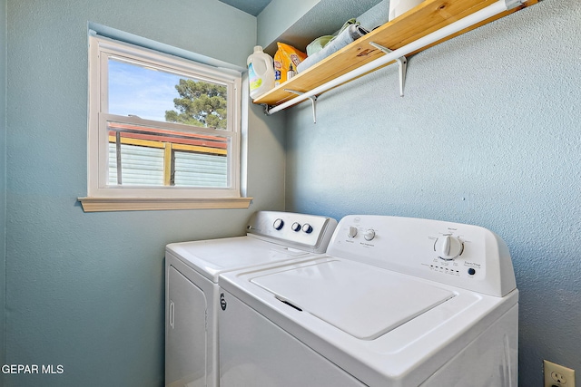 laundry room featuring washing machine and dryer