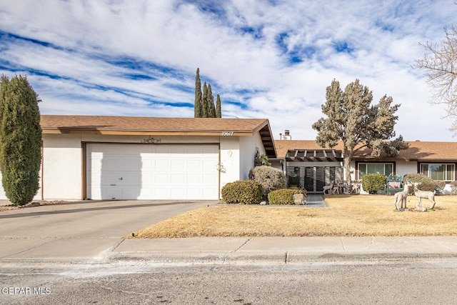 single story home featuring a garage