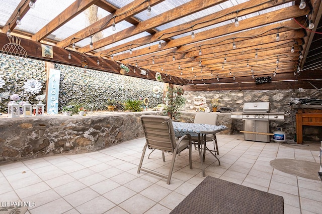 view of patio / terrace with an outdoor kitchen, a grill, and a pergola