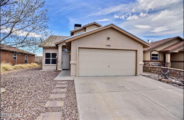 ranch-style house with a garage