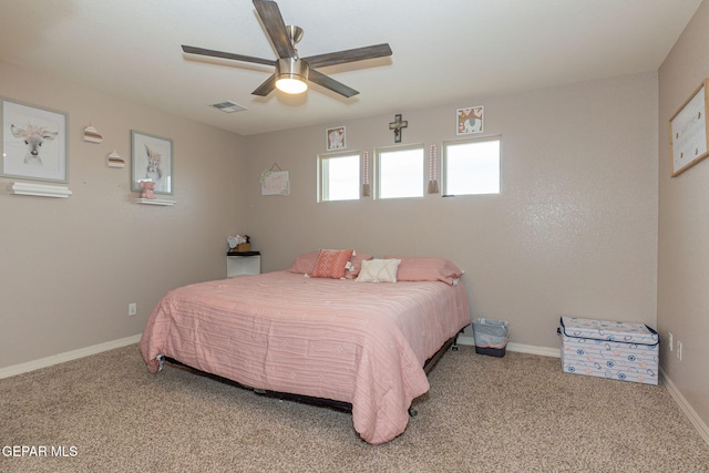 bedroom with light colored carpet and ceiling fan