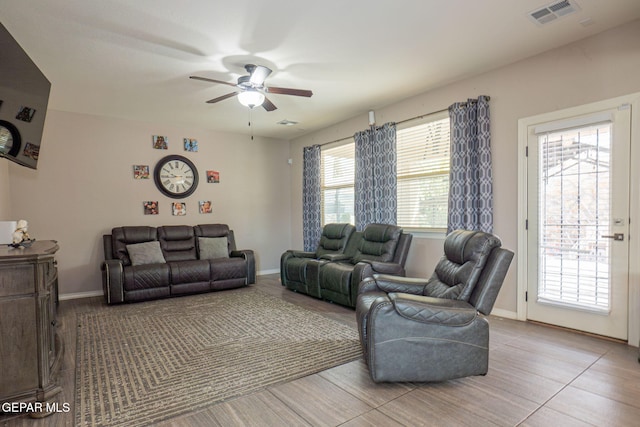 living room featuring ceiling fan