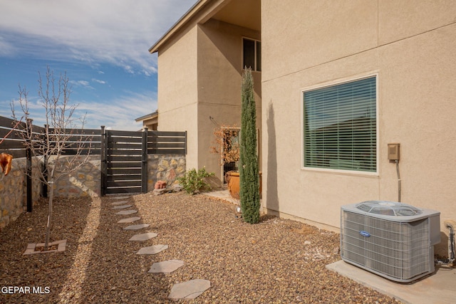 view of yard with central AC unit