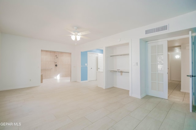 spare room featuring ceiling fan