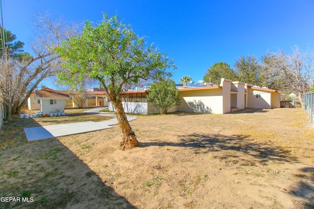 view of front of home with a front lawn