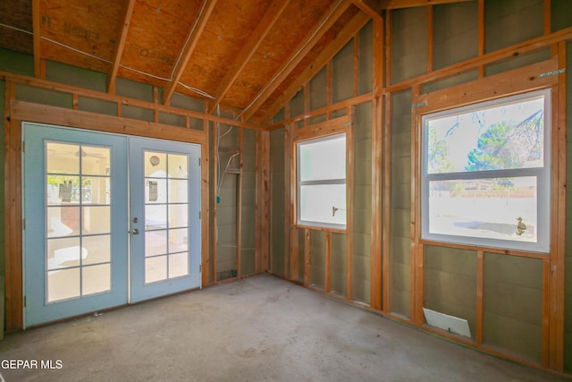 misc room with lofted ceiling and french doors