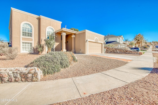 view of front of home with a garage