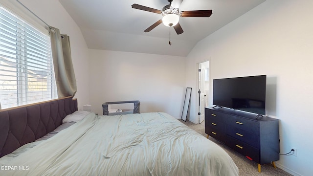 carpeted bedroom with lofted ceiling and ceiling fan