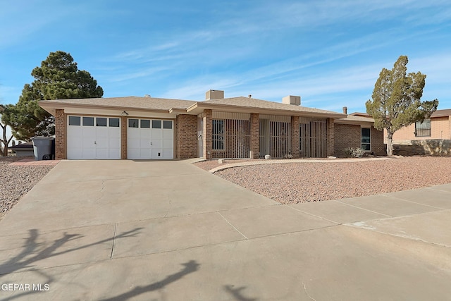 single story home featuring a garage