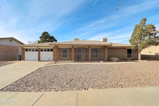 single story home with a garage