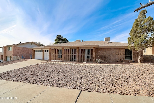 single story home with a garage