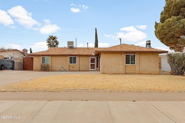 single story home featuring central AC