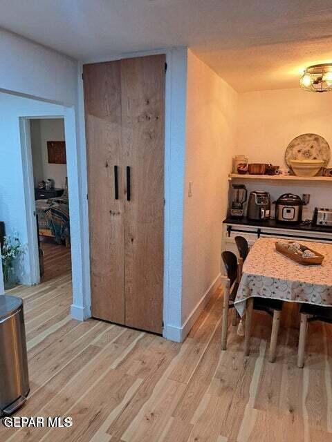 dining space featuring light hardwood / wood-style floors