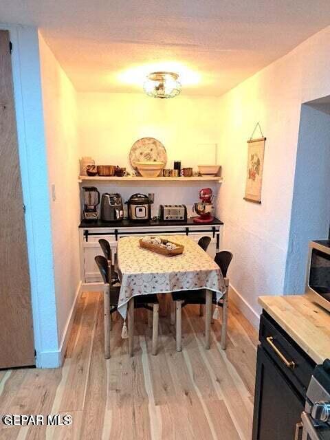 dining room with light wood-type flooring