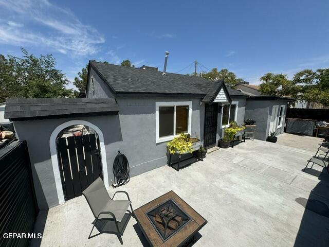 back of house featuring a patio