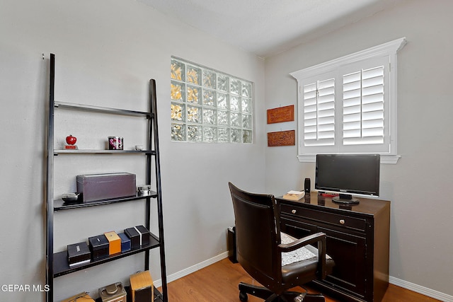 office area with light wood-type flooring