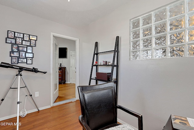 office space featuring hardwood / wood-style floors