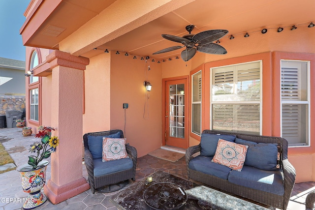 view of patio featuring ceiling fan