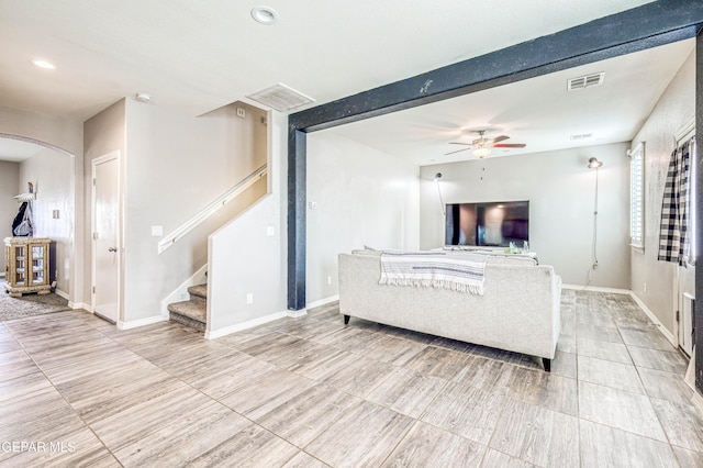 living room with ceiling fan