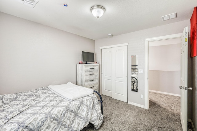 bedroom featuring carpet floors and a closet