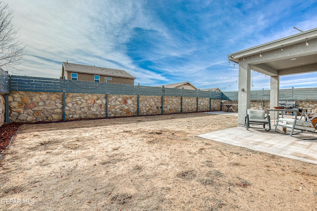 view of yard with a patio