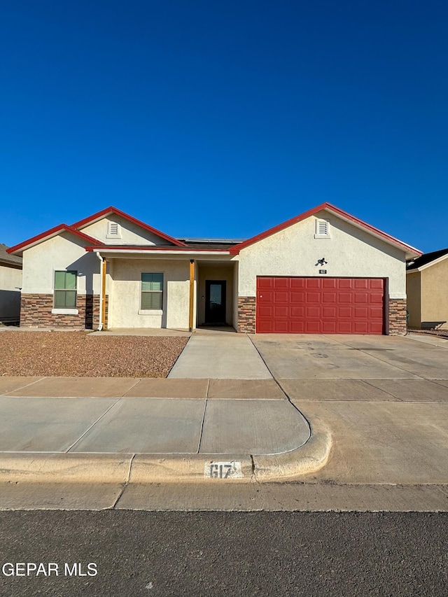 view of front of home with a garage