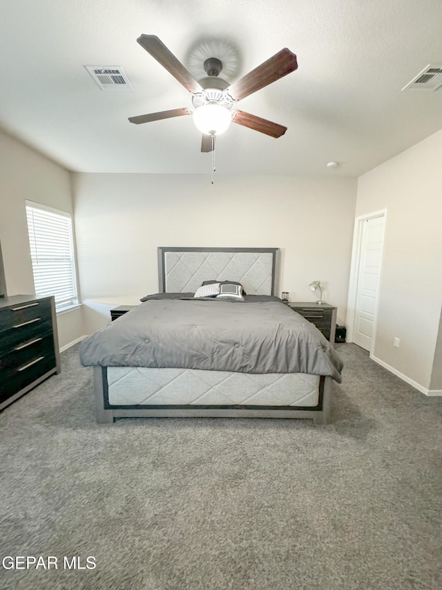 carpeted bedroom featuring ceiling fan