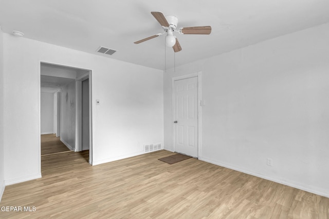 unfurnished room with ceiling fan and light hardwood / wood-style floors