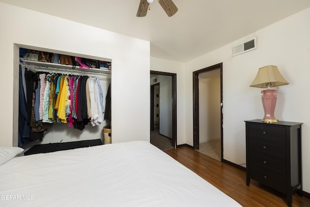 5047 Conley Rd, El Paso, TX 79932 - bedroom with dark wood-type flooring, a closet, and ceiling fan