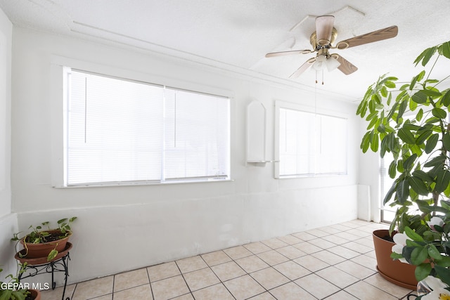 5047 Conley Rd, El Paso, TX 79932 - empty room featuring ceiling fan and light tile patterned floors
