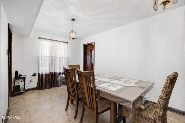 5047 Conley Rd, El Paso, TX 79932 - dining space with a textured ceiling