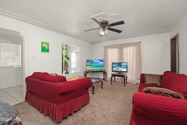 5047 Conley Rd, El Paso, TX 79932 - tiled living room featuring ceiling fan and a textured ceiling