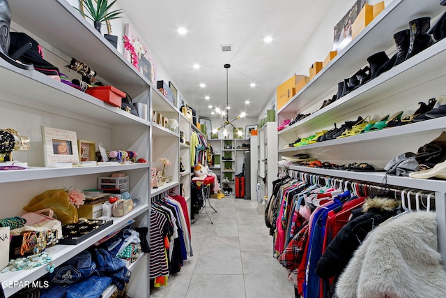 walk in closet featuring light tile patterned floors