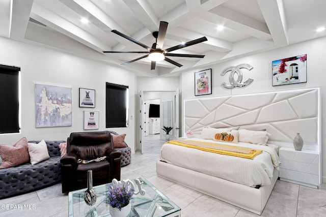 tiled bedroom with ceiling fan and beam ceiling