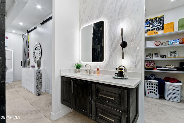 bathroom with vanity and tile patterned flooring