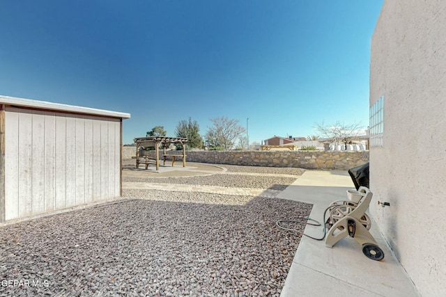 view of yard featuring a pergola and a patio