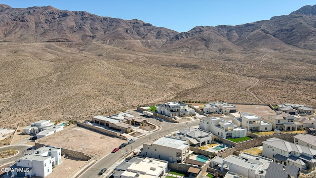 bird's eye view featuring a residential view and a mountain view