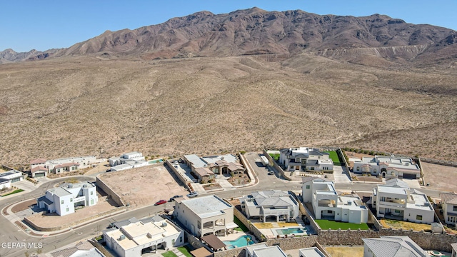 drone / aerial view with a mountain view and a residential view