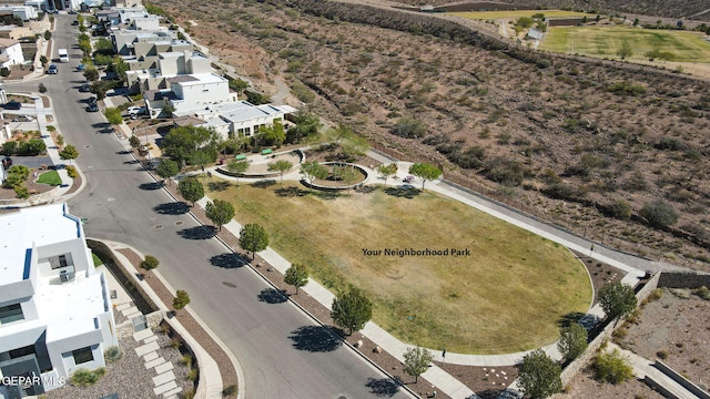 birds eye view of property with a residential view