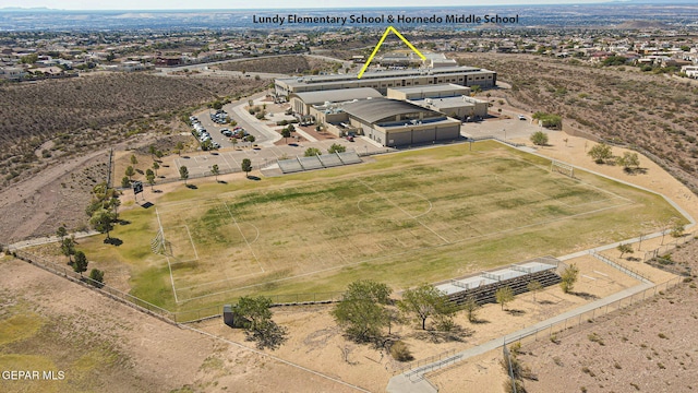 birds eye view of property featuring a rural view