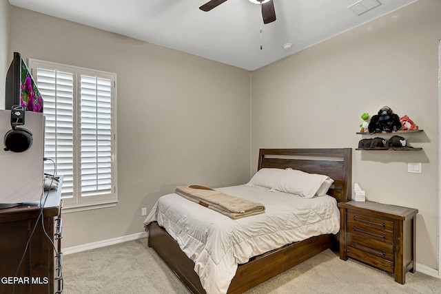 bedroom with visible vents, a ceiling fan, baseboards, and carpet floors