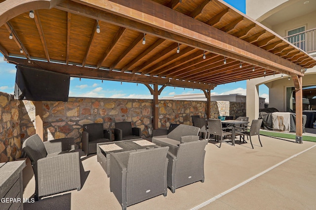 view of patio / terrace with an outdoor living space and outdoor dining area