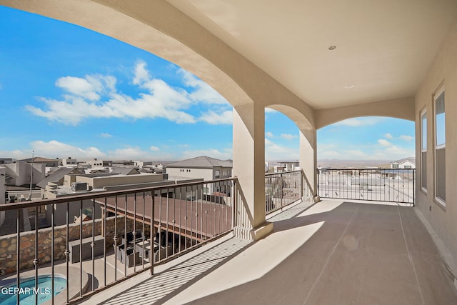 balcony featuring a residential view