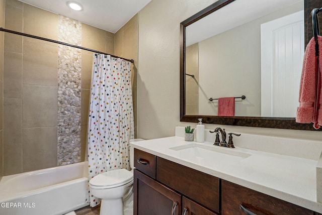 full bath featuring toilet, shower / bath combo, and vanity