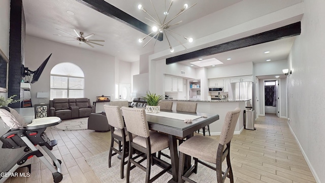 dining room with ceiling fan and beam ceiling