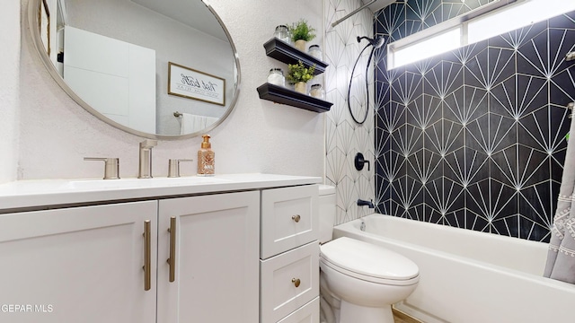 full bathroom with vanity, toilet, and shower / bath combo with shower curtain