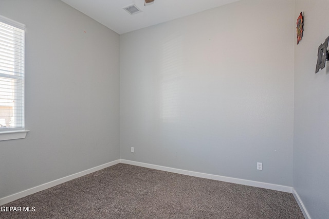 view of carpeted spare room