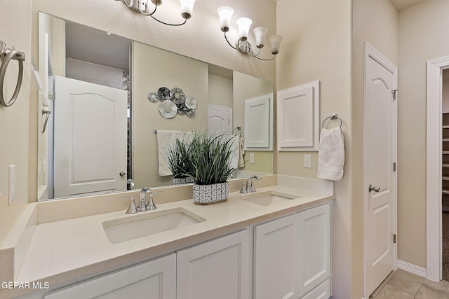 bathroom featuring vanity and tile patterned flooring