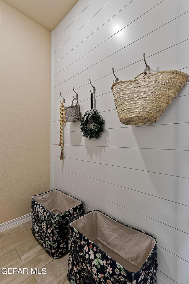 mudroom with hardwood / wood-style flooring